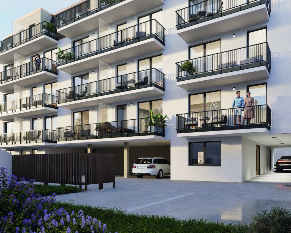 Modernes Wohngebäude mit Balkonen, zwei Personen genießen die Aussicht; Autos im Erdgeschoss.