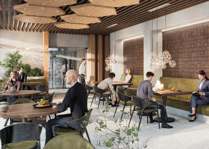 Modernes Café mit eleganter Einrichtung, Personen essen und lesen in entspannter, einladender Atmosphäre.